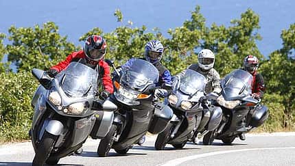 Vier Reiseprofis